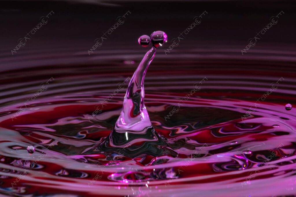 macro photography goccia gocce d'acqua water drop drops high speed sync riflessi reflections splash colori colours bounce bouncing pianeti planets