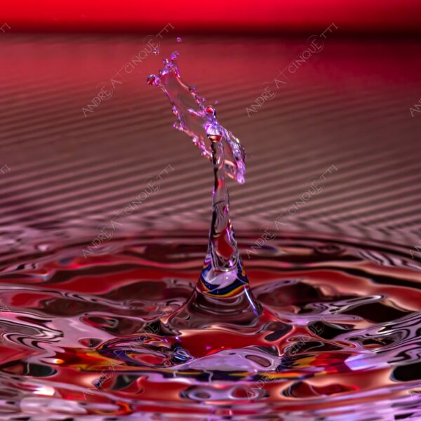 macro photography goccia gocce d'acqua water drop drops high speed sync riflessi reflections splash colori colours bounce bouncing pattern strisce stripes